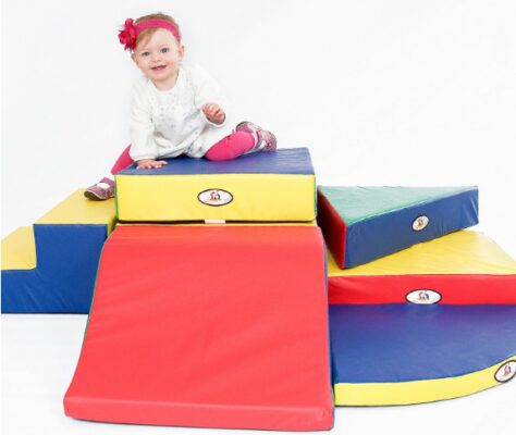 This is an image of two girls playing on Foamnasium Playground (9-Piece)