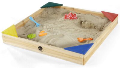 this is an image of a junior plum sand box with protective and internal ground cover recommended for 18 months and up. 