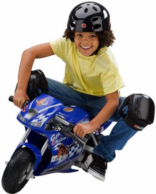 This is an image of a little boy riding a pocket rocket ebike. 