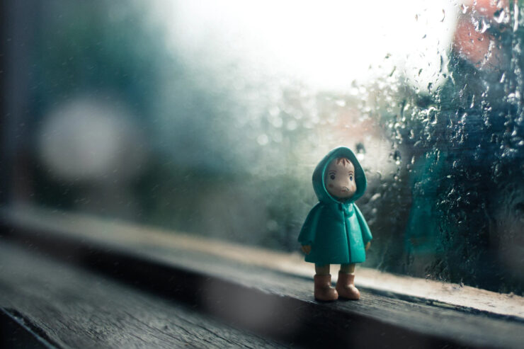 this is an image of a figurine wearing a rain jacket