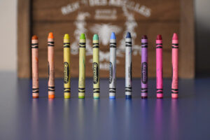 this is an image of colorful crayola crayons standing up 