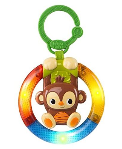 this is an image of a shake & glow monkey car seat and stroller for kids.