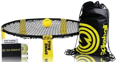 This is an image of teen's spikeball game set in black and yellow colors