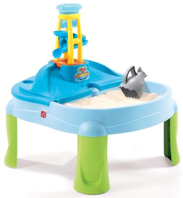  this is an image of a Kid's Splash N Scoop Bay Sand and Water Table with cover and 7-piece accessory set. 