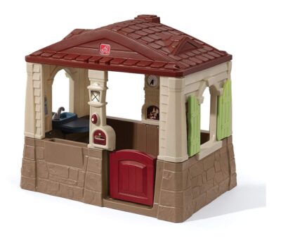 This is an image of a kid's outdoor cottage playhouse.