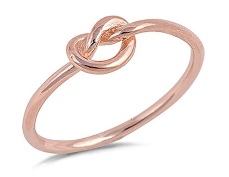 this is an image of a rosegold sterling silver knot ring for sweet 16 girls.