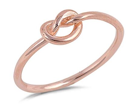 this is an image of a rosegold sterling silver knot ring for sweet 16 girls. 