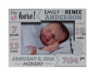 This is an image of a baby girl photo frame with the baby's information printed.