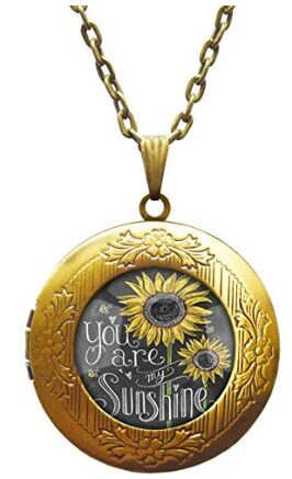 This is an image of girl's sunflower neckless in golden color
