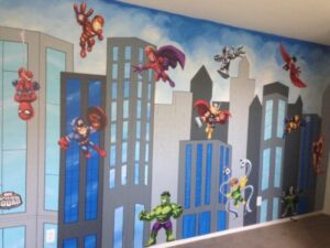 Superhero photo booth and backdrop with city building flying superheros 
