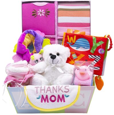 This is an image of baby girls basket gift with different toys 
