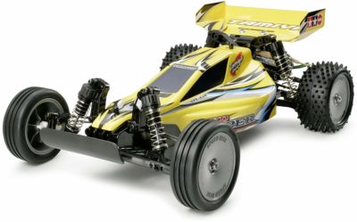 This is an image of a yellow rc tamiya. 