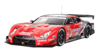 This is an image of a red Xanavi Nismoa RC Tamiya. 
