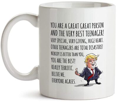 This is an image of teen's trimp mug with quote, white color.