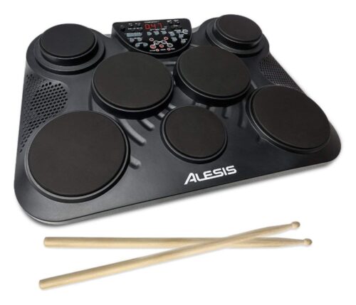 this is an image of an ultra-portable 7 pad electronic table top drum kit for kids. 