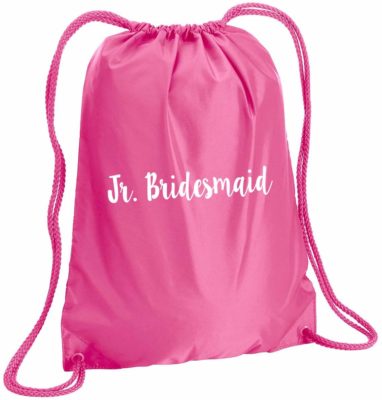 This is an image of a hot pink bag with jr. bridesmaid print. 