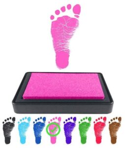 This is an image of 1 year olds art and craft REIGNDROP Ink Pad for Baby Footprint, Handprint, Create Impressive Keepsake Stamp, Non-Toxic and Acid-Free Ink, Easy to Wipe and Wash Off Skin, Smudge Proof, Long Lasting Keepsakes (Pink)