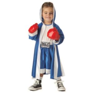 Kid with a black eye in boxing outfit with red gloves 
