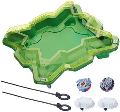 This is an image of kids beyblade battle set with green stadium and two beyblades
