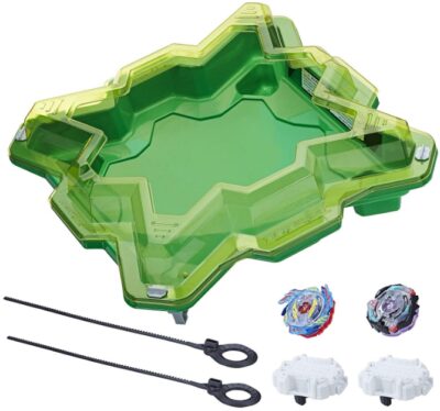 This is an image of kids beyblade battle set with green stadium and two beyblades 