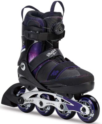 This is an image of kids roller blade in black and purple colors