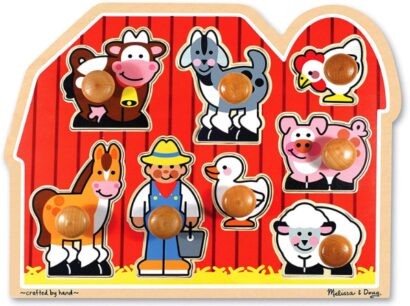 This is an image of toddler's wooden large farm puzzle in colorful colors