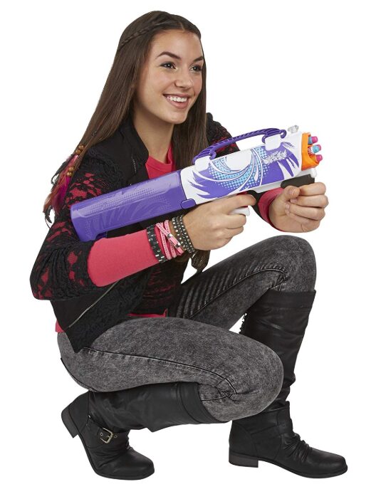 girl holding a nerf gun toy, pink