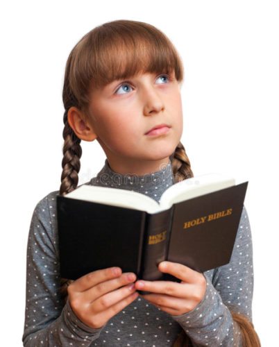 girl reading the bible and thinking