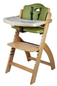 Wooden Keekaroo High Chair with green padded back and cedar wooden legs