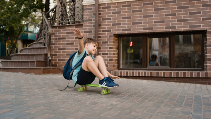 kid on electric skateboard