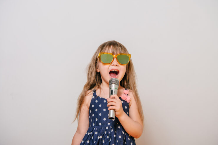 kids singing karaoke