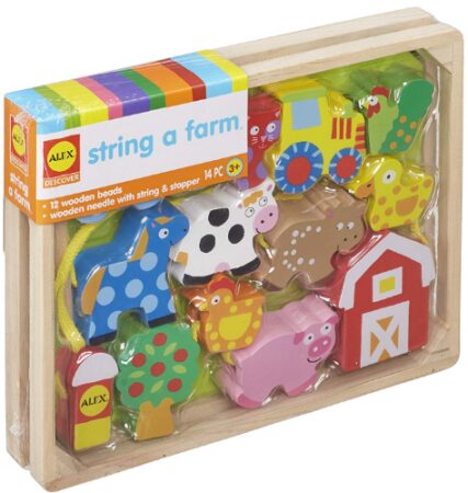 This is an image of Farm toy with animals attached with string
