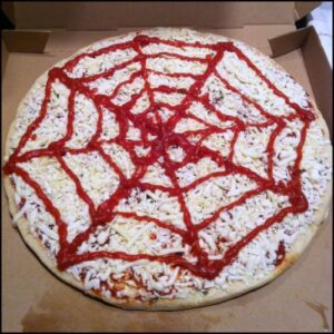 pizza with a spiderman web logo made from puree 