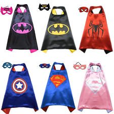 superhero capes with 2 girls wearing them