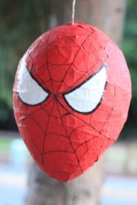 superhero pinata game with a spiderman head for a pinata 