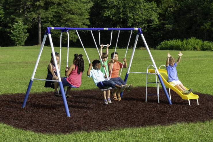 children playing on swing set