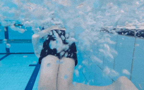 boy swim in pool